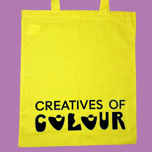 yellow tote bag with black print
